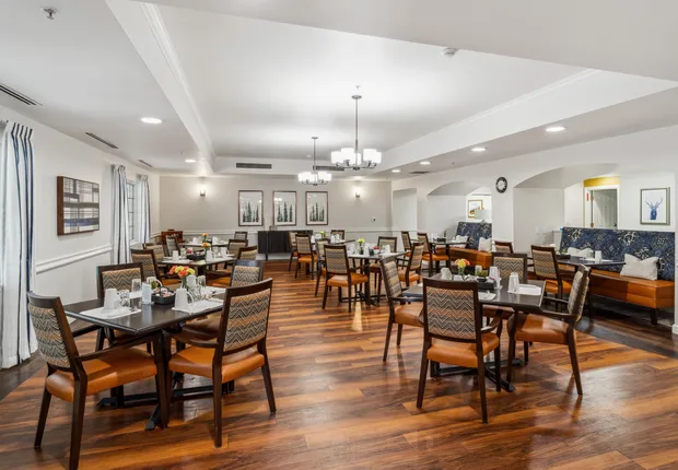 Senior Living in Lakewood featuring a main dining room with wood floors.