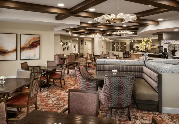 Senior Living in Rancho Cucamonga, CA featuring ample seating in a tastefully decorated lobby