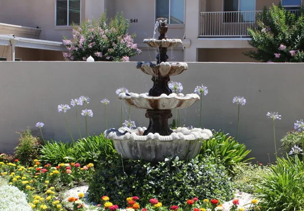 Senior Living in Madera with a fountain in the courtyard