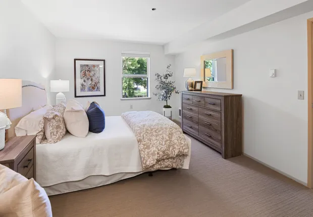 Spacious bedroom with room for a queen+ sized bed in our Senior Living community in Tacoma