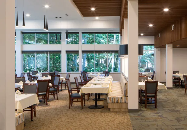 Large community dining room with modern fixtures in our Senior Living community in Tacoma