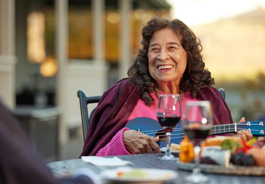 Active senior living homes Fremont, California encouraging wine and outdoor dinner.