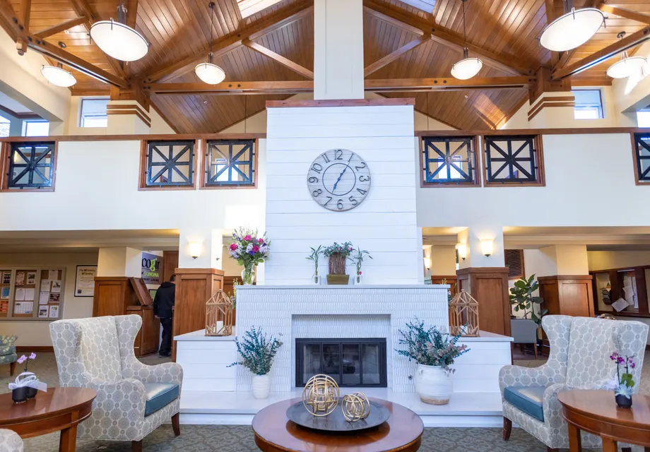 Sonoma senior living with a large fireplace and ample seating for socializing.