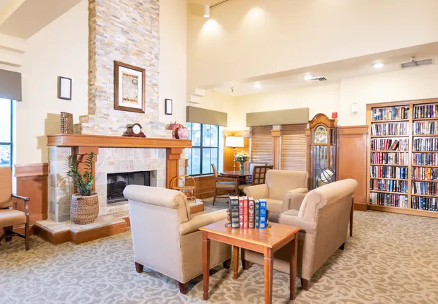Senior Living in Vacaville featuring a fireplace and seating