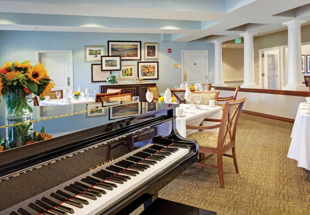 Senior Living in Sonoma featuring a piano in our dining area