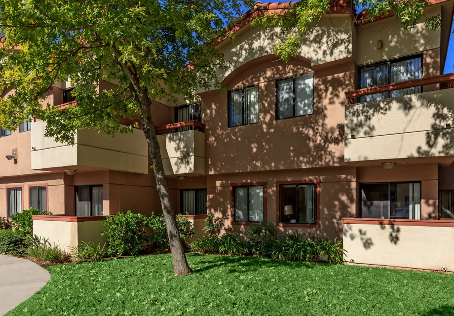 Senior Living in Culver City featuring mature trees and shade.