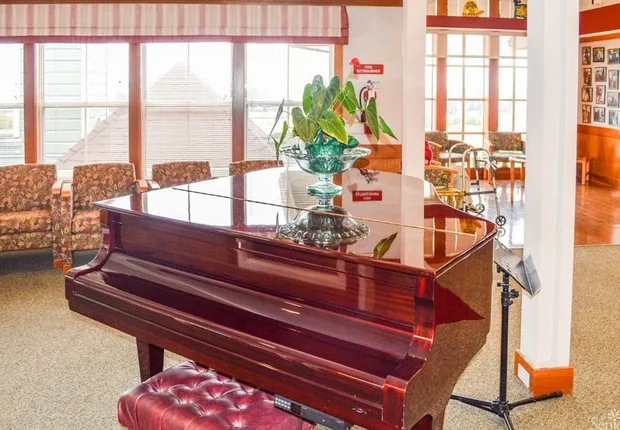 Our Senior living community in Belmont features a cherry wood piano