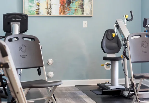 A fitness room with machines perfect for seniors.