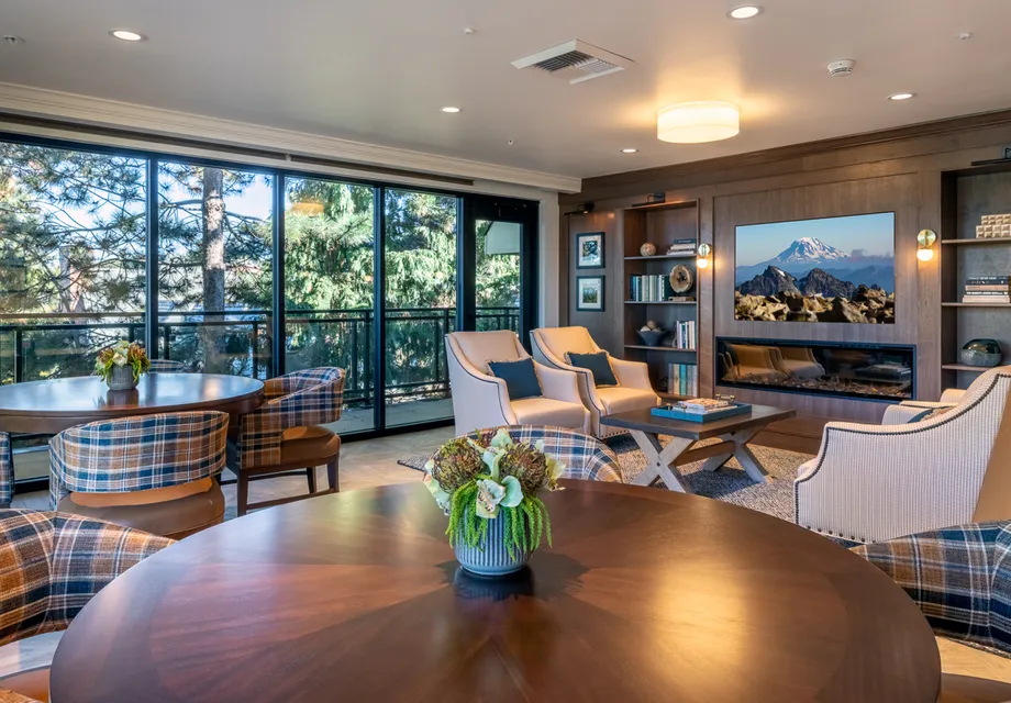 Open dining room with large windows.