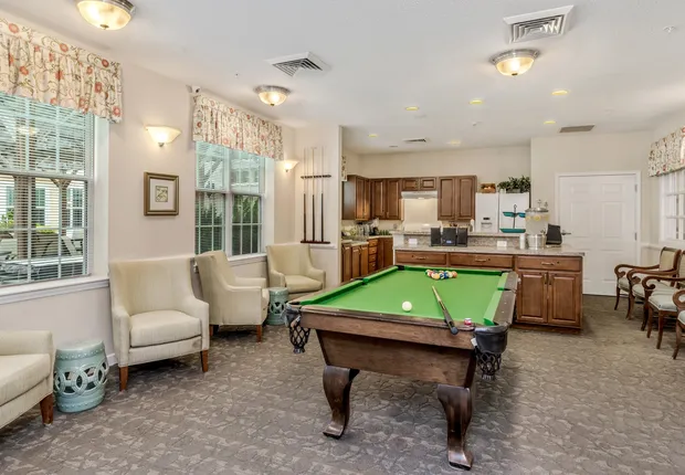 Senior living in Huntersville game room with pool table