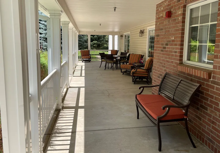 Senior Living in Lakewood featuring covered patio seating.