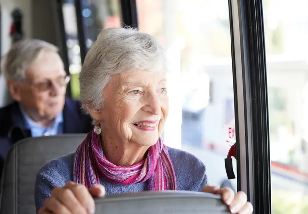 Memory Care in Ogden; a senior woman is on our bus to spend a day in the city.