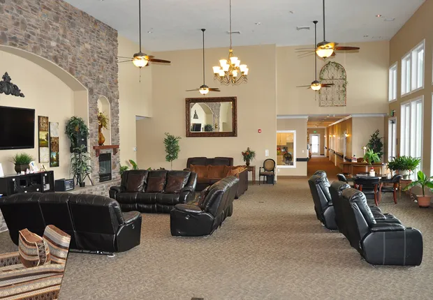 Senior Living in Ogden, UT. A lobby with cozy leather chairs.
