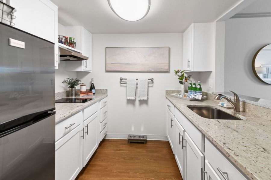 white and brown model kitchen area