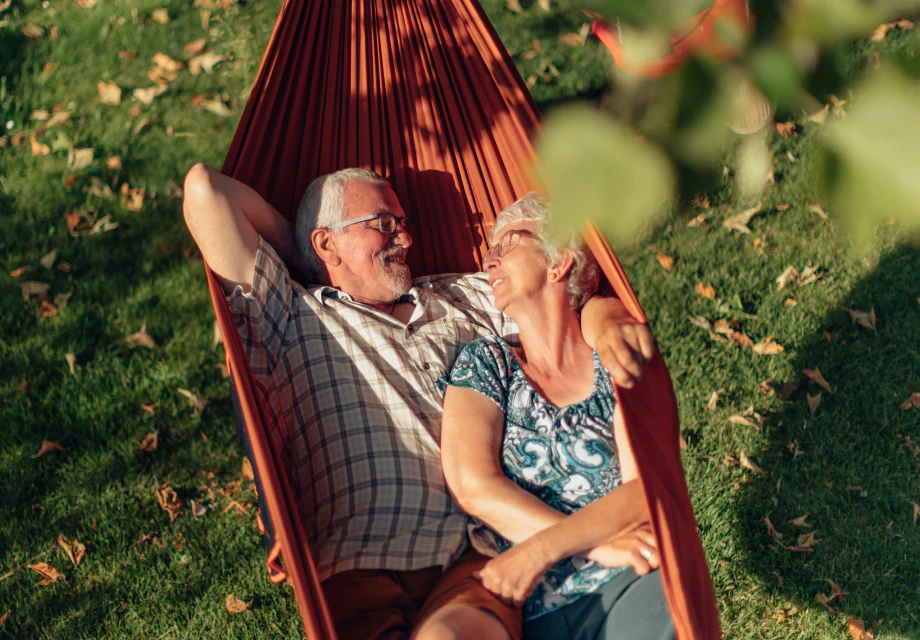 Two seniors in a hammock