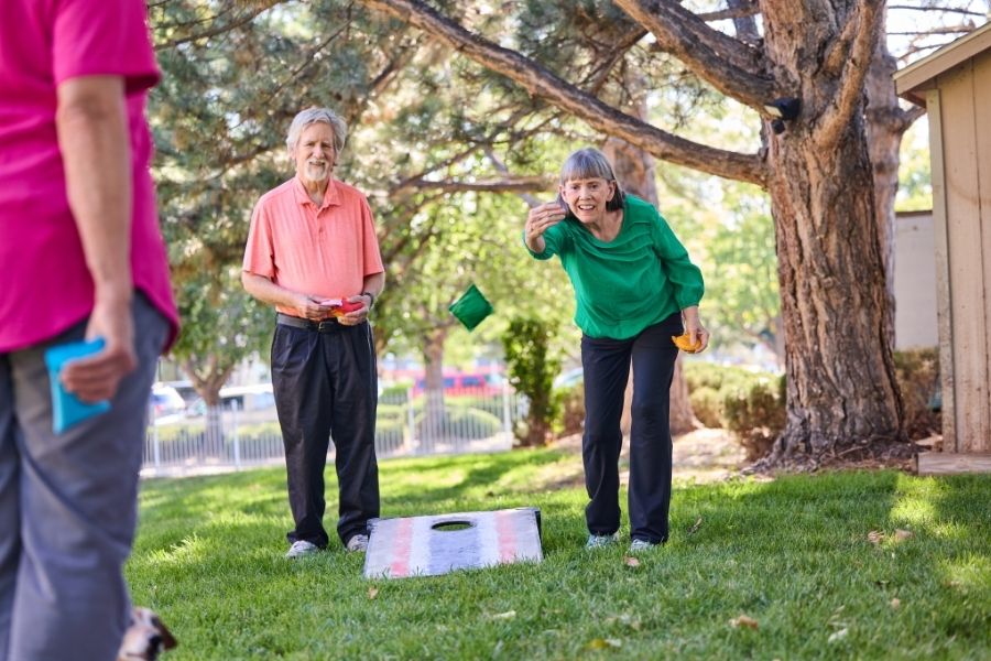 seniors playing cornhole