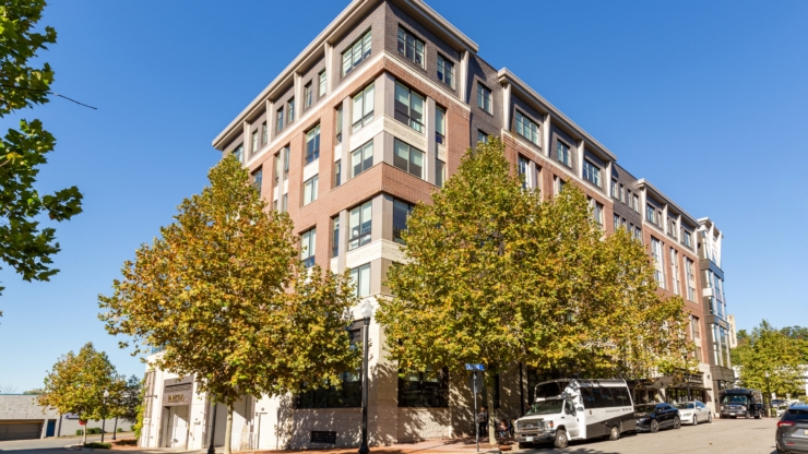 A welcoming residence surrounded by vibrant trees, perfect for nurturing community and comfort.