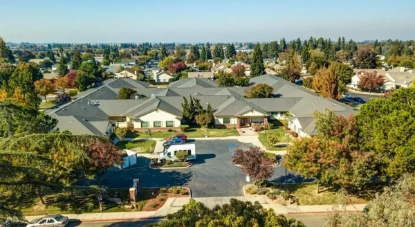 A welcoming community surrounded by beautiful gardens, inviting spaces, and serene surroundings.