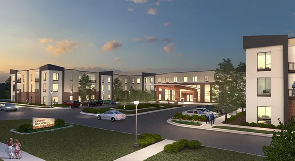 Welcoming grounds with a warm sunset, inviting residents and families to experience community and comfort.