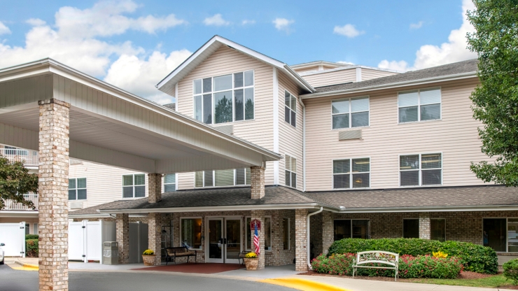 Nestled within a welcoming community, this bright residence offers a serene atmosphere and accessible entry.