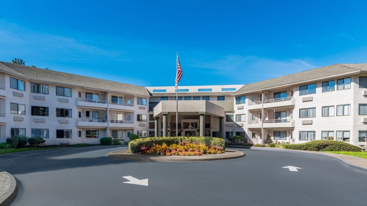 A welcoming community surrounded by beautiful gardens, offering comfort and companionship.
