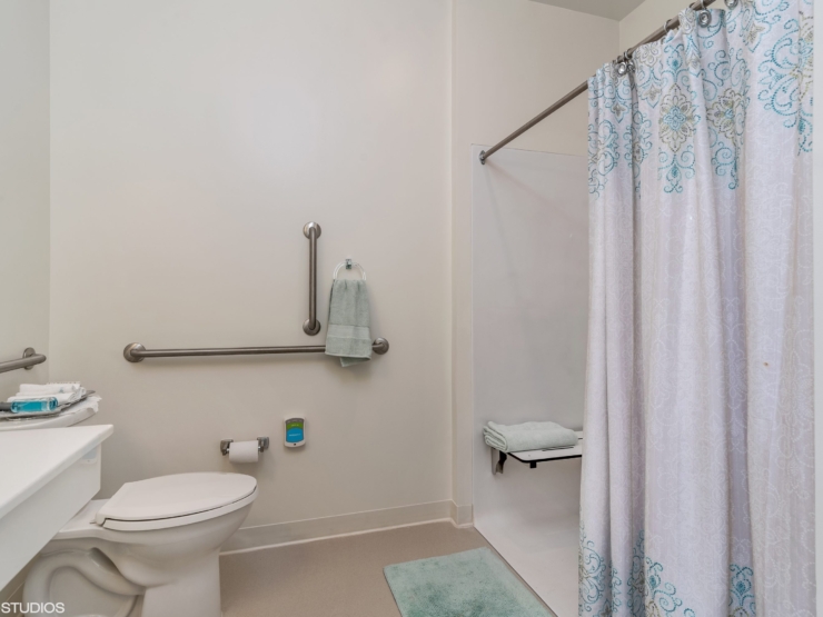 Bright and inviting bathroom, designed for comfort and safety, promoting a sense of home.