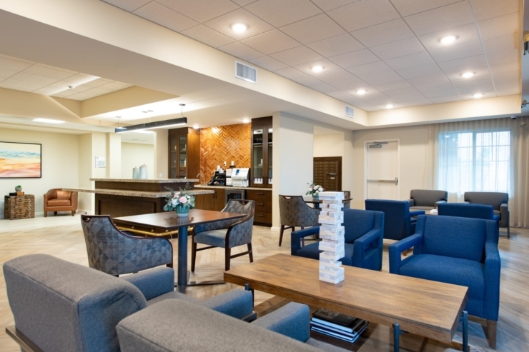 A warm gathering space inviting connection, featuring comfortable seating and a friendly atmosphere.