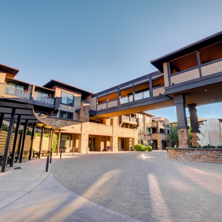 Bright and inviting, this stylish retirement community features spacious walkways, lush landscaping, and charming architecture, fostering a sense of belonging.