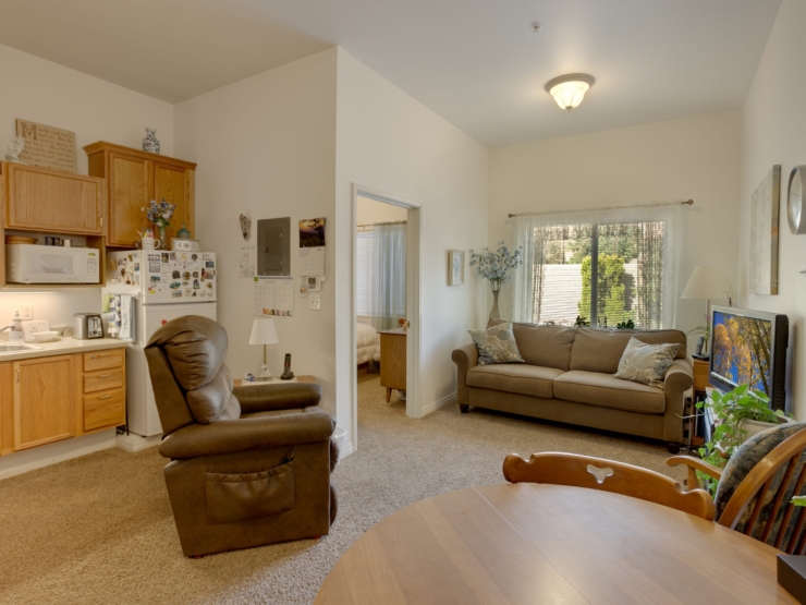 A cozy, inviting living space filled with warmth, perfect for fostering community and comfort.