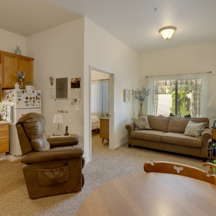 A cozy, inviting living space filled with warmth, perfect for fostering community and comfort.