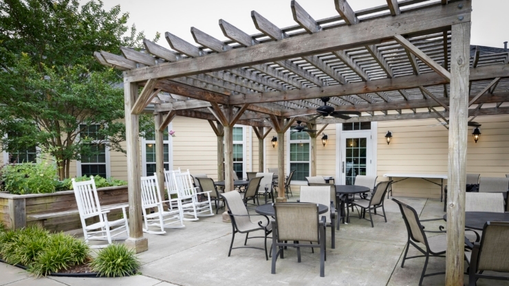 A welcoming outdoor space with comfortable seating, perfect for community gatherings and relaxation.