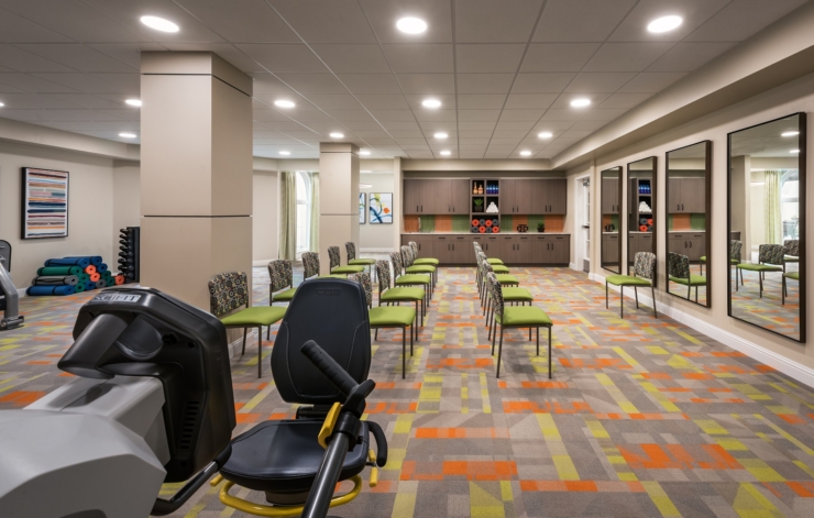 A welcoming fitness area filled with vibrant colors, promoting community and active living.