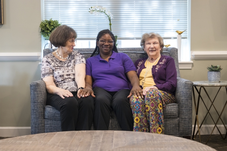 Warm smiles and friendly conversation create a cozy atmosphere of community and comfort.