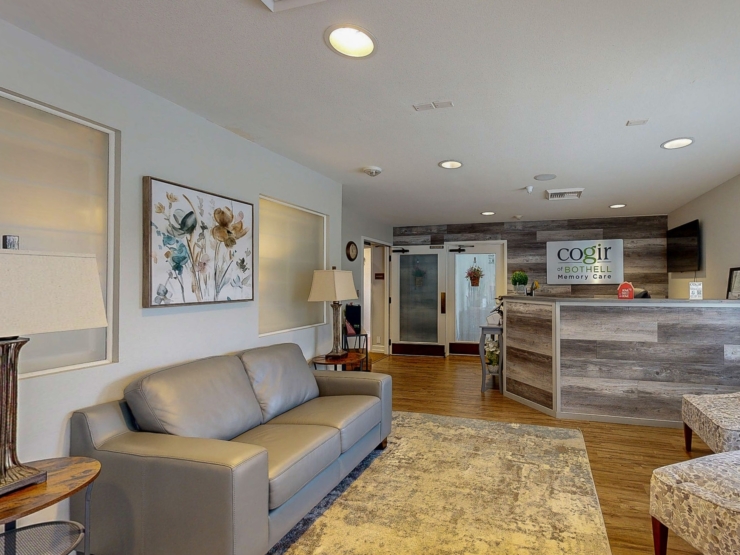 A warm, inviting reception area with cozy seating, soft lighting, and welcoming decor.