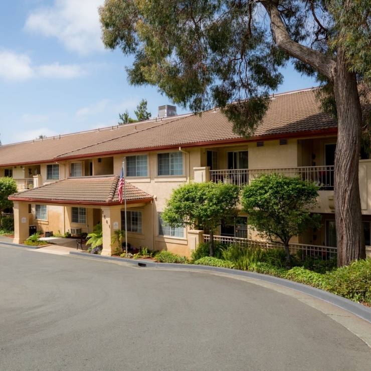 A welcoming community nestled among lush greenery, fostering comfort and connection for all residents.