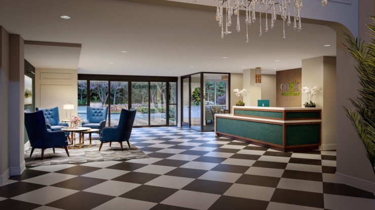 Bright and inviting lobby with comfortable seating, perfect for community gatherings and relaxation.