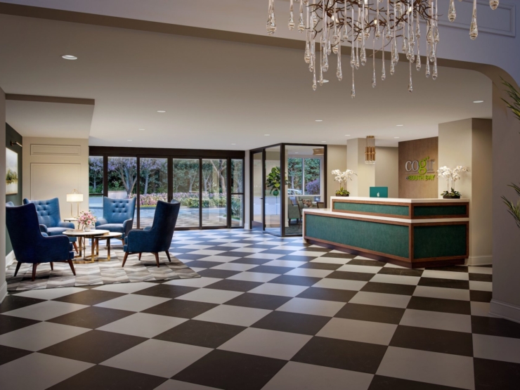Bright and inviting lobby with comfortable seating, perfect for community gatherings and relaxation.