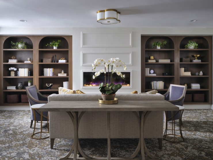 A welcoming lounge featuring elegant furnishings, calming decor, and a warm ambiance for community gatherings.