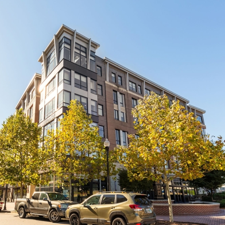 A welcoming community hub framed by golden trees, showcasing warmth and connection in a vibrant setting.