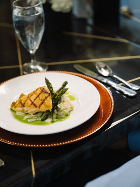 A beautifully plated meal awaits, symbolizing community and shared moments in a welcoming dining space.