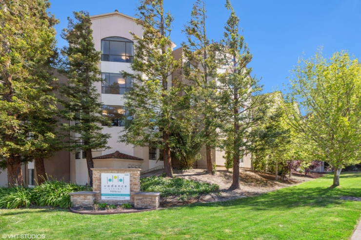 A welcoming residence nestled among lush greenery, inviting community and comfort for all.