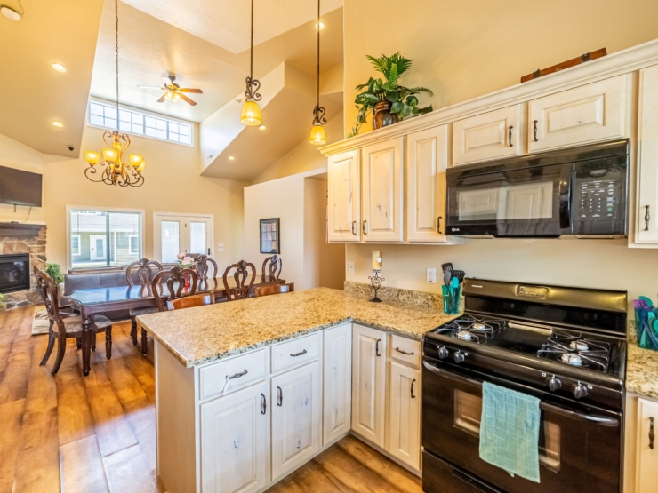 A bright, inviting kitchen and dining area, perfect for community gatherings and shared meals.