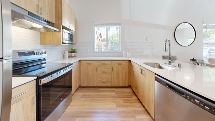 Bright and inviting kitchen space, perfect for warm gatherings and shared meals in a community setting.