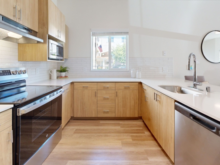 Bright and inviting kitchen space, perfect for warm gatherings and shared meals in a community setting.