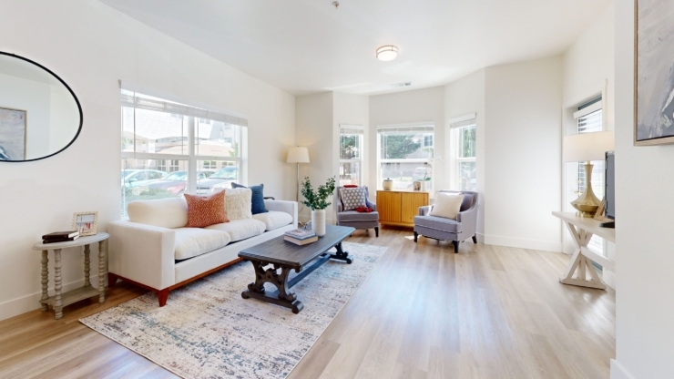 Bright and inviting, this living space fosters community and comfort, perfect for relaxation and connection.
