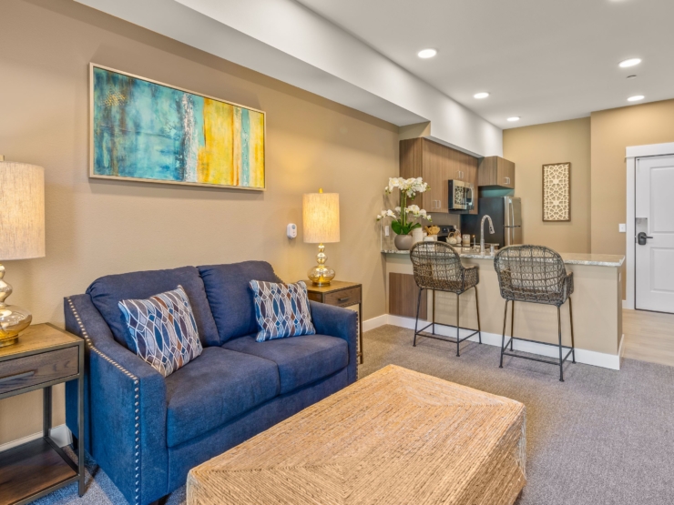 A cozy, inviting living space with warm colors, comfortable seating, and a welcoming atmosphere.