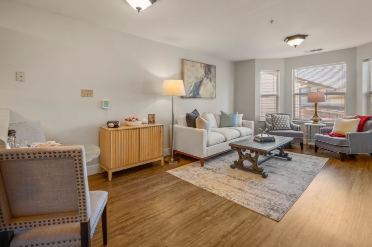 A welcoming living space, perfect for connection and comfort, featuring warm lighting and inviting decor.