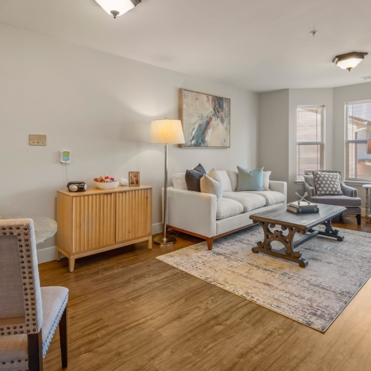 A welcoming living space, perfect for connection and comfort, featuring warm lighting and inviting decor.