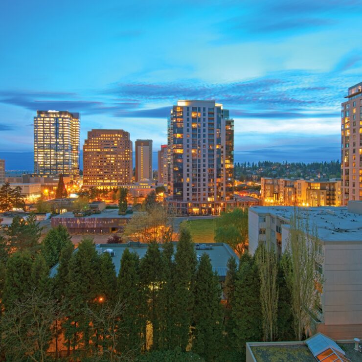 A vibrant city skyline at dusk, radiating warmth and community spirit, perfect for comfortable living.