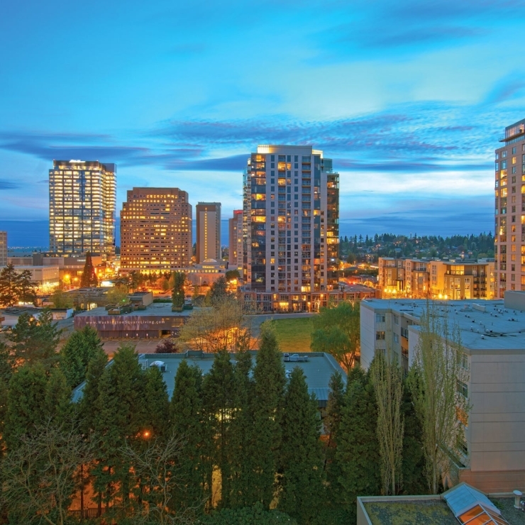 A vibrant urban skyline at dusk, showcasing community warmth and a welcoming atmosphere.